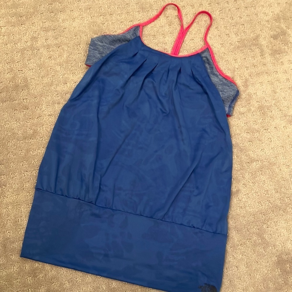 The north face blue / pink tank top with built in bra. EUC